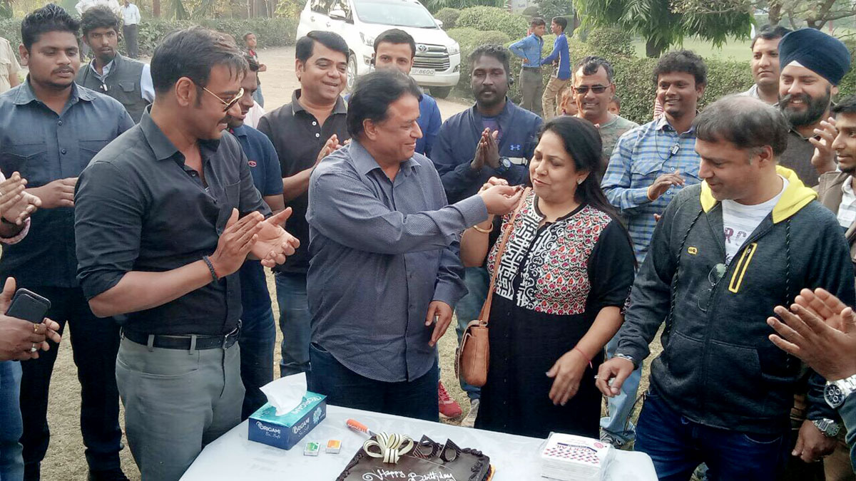 Ajay Devgn celebrates producer Kumar Mangat Pathak’s birthday on the sets of ‘raid’