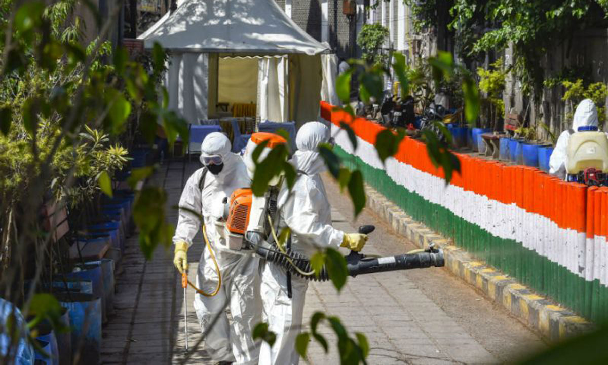 Health workers sanitise an area near the Nizamuddin mosque where the Tablighi Jamaat event was held, in New Delhi on April 1, 2020. (PTI)