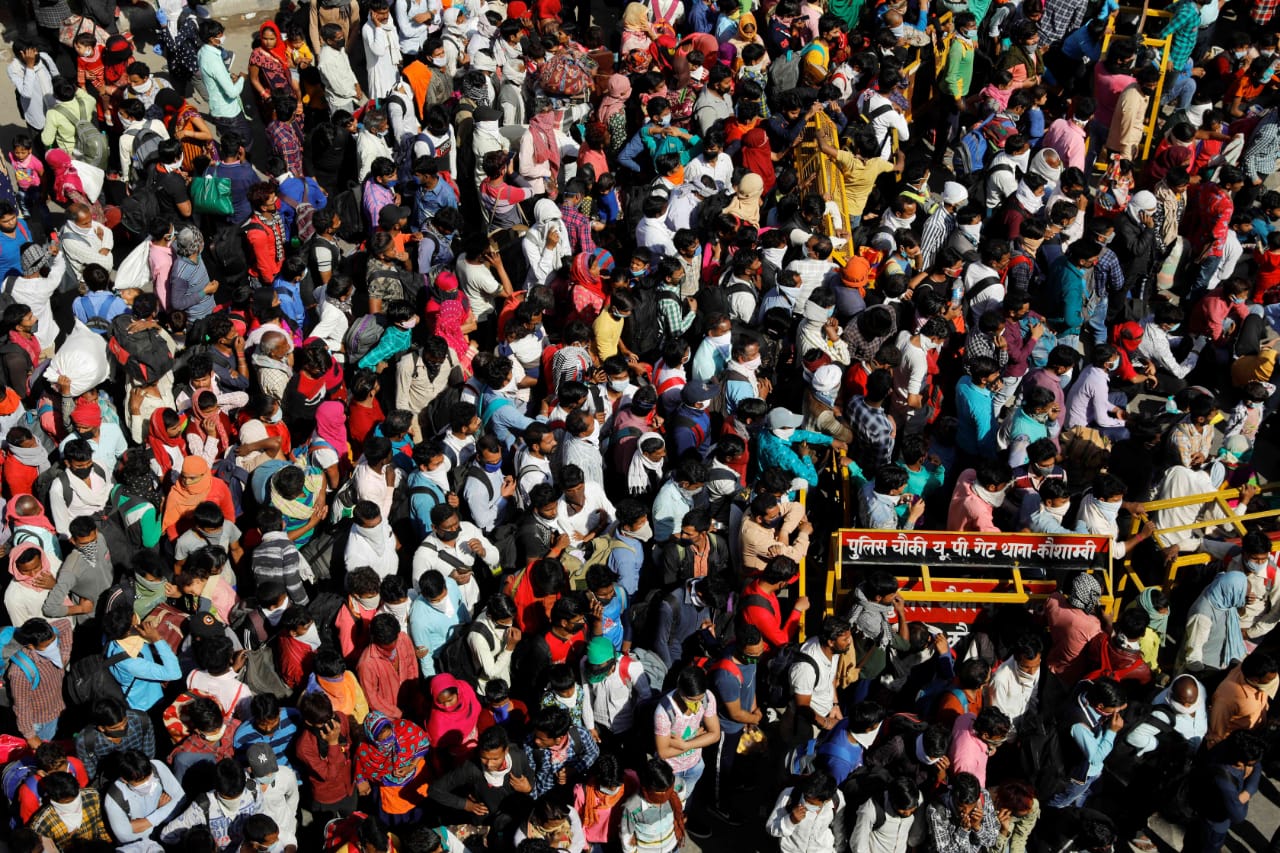 Migrant workers in Ghazibad trying to catch a bus to Uttar Pradesh on March 28 in the midst of a national lockdown to slow the spread of the coronavirus.| PTI