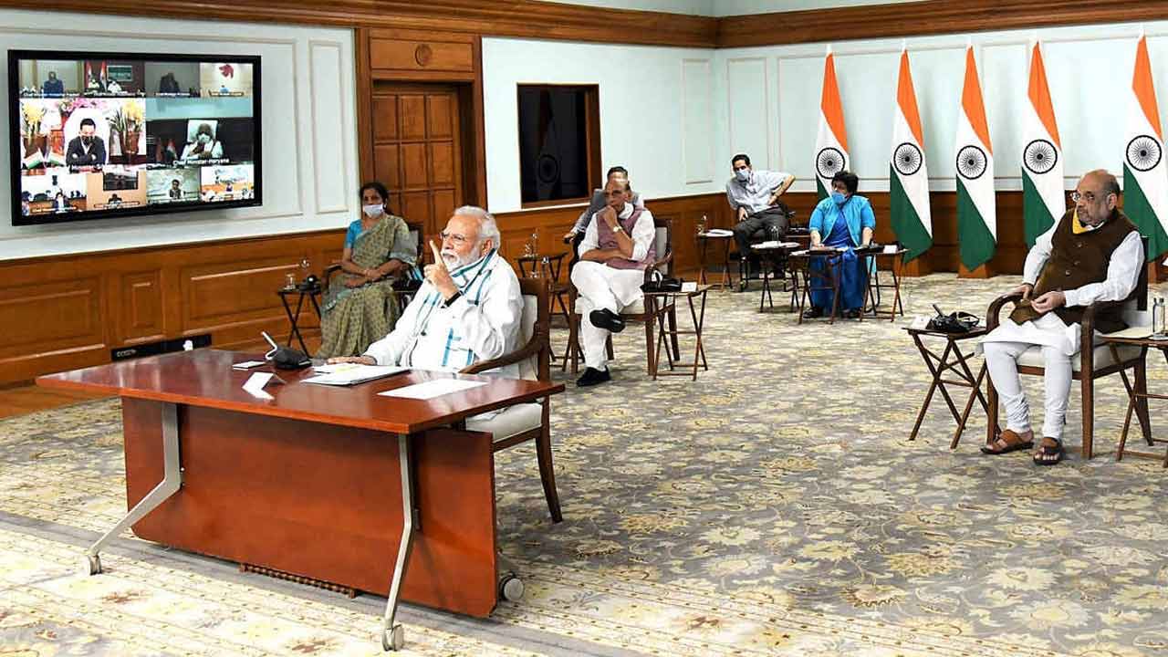 Prime Minister Narendra Modi and his ministers and officials interact with chief ministers via video conference